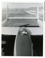 Photograph of Howard Hughes and the XF-11, Culver City, California, July 7, 1946