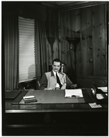 Photograph of Howard Hughes at his desk, circa 1947