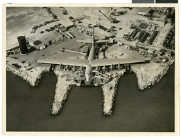 Aerial photograph of the fully assembled Flying Boat docked at Los Angeles Harbor, June 23, 1947