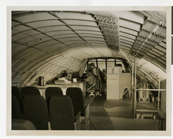 Photograph of Howard Hughes on the flight deck of the Flying Boat, November 1, 1947