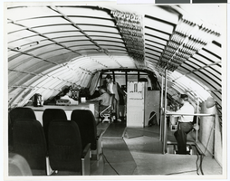 Photograph of Howard Hughes on the flight deck of his Flying Boat, November 1, 1947