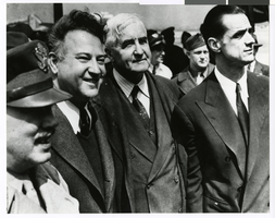 Photograph of Howard Hughes and others with the Hughes XH-17 plane, circa 1952