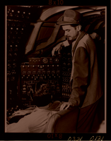 Photograph of Howard Hughes and assistant in the cockpit of the HK-1 Hercules (Flying Boat), circa 1947