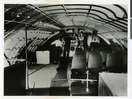 Photograph of Howard Hughes with an engineer in Hughes Flying Boat, Los Angeles, November 2, 1947
