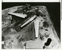 Aerial photograph of the Hughes Flying Boat on Terminal Island in the Los Angeles Harbor, 1947