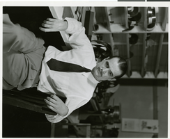 Photograph of Howard Hughes in his RKO office, 1946-1957