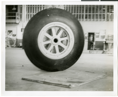 Photograph of an airplane wheel, circa 1937