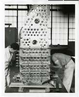Photograph of an airplane part during assembly, circa 1920s-1950s