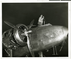 Photograph of Hiram "Tommy" Thurlow and the Lockheed 14, New York, New York, July 9, 1938