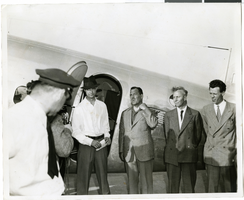 Photograph of Howard Hughes and his crew in Floyd Bennett Field, New York, July 10, 1938