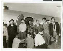 Photograph of Howard Hughes and his crew in Floyd Bennett Field, New York, July 10, 1938