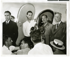 Photograph of Howard Hughes and his crew in Floyd Bennett Field, New York, July 10, 1938