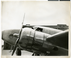 Photograph of Howard Hughes in his Lockheed 14 aircraft, 1938