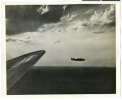 Photograph of the Lockheed 14 aircraft over New York City, July 1938