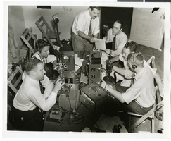 Photograph of radio operators, July 13, 1938