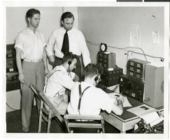 Photograph of radio operators, July 13, 1938
