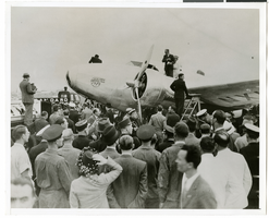 Photograph of a crowd surrounding the Lockheed 14 aircraft at Le Bourget Airfield, France, July 1938