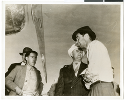 Photograph of Howard Hughes and three men, Minneapolis, Minnesota, July 14, 1938