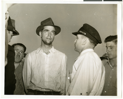 Photograph of Howard Hughes after arriving in Minneapolis, Minnesota, July 14, 1938