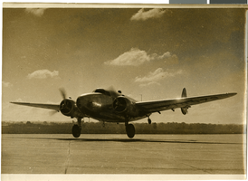 Photograph of Howard Hughes after arriving in Minneapolis, Minnesota, July 14, 1938