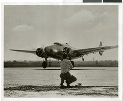 Photograph of Howard Hughes's plane taking off, Minneapolis, Minnesota, July 14, 1938