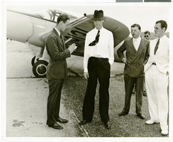 Photograph of Howard Hughes with unidentified men, New York, circa 1938