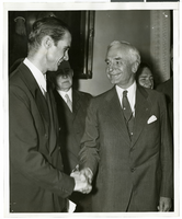 Photograph of Howard Hughes and other men, July 1938