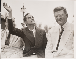 Photograph of Howard Hughes at a parade, Chicago, July 30, 1938