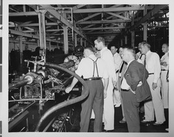 Photograph of Howard Hughes and other men, circa 1938