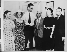 Photograph of Howard Hughes with people, circa 1930s