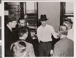 Photograph of Howard Hughes and other men, circa 1938