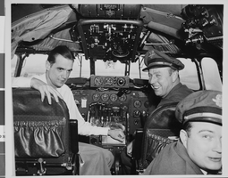 Photograph of Howard Hughes in cockpit, New York, February 15, 1946
