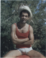 Photograph of Vassili Sulich sitting outdoors, wearing a straw hat,1950s-1960s