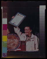 Photograph of Jim Arnold holding proclamation, Culinary Union, Las Vegas (Nev.), 1990s (folder 1 of 1)
