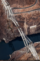 Photograph showing an aerial view of Mike O'Callaghan-Pat Tillman Memorial Bridge construction, the hairpin turn on the Nevada side of Hoover Dam, and the Colorado River, June 30, 2009