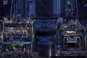 Photograph of ironworkers preparing formwork for pouring concrete during construction of the Mike O'Callaghan-Pat Tillman Memorial Bridge, Nevada border, July 1, 2009