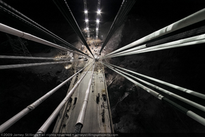 Photograph showing an aerial view of construction of the Mike O'Callaghan-Pat Tillman Memorial Bridge as seen from temporary pylons on the Arizona side of the bridge, July 1, 2009