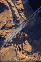 Photograph showing an aerial view of the Mike O'Callaghan-Pat Tillman Memorial Bridge deck and the original hairpin turn leading to Hoover Dam, Nevada border, September 10, 2009