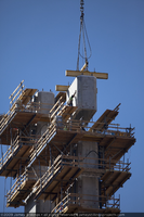 Photograph of ironworkers setting a pier segment during construction of the Mike O'Callaghan-Pat Tillman Memorial Bridge, Nevada-Arizona border, November 10, 2009