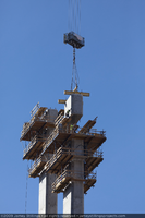 Photograph of ironworkers setting a pier segment during construction of the Mike O'Callaghan-Pat Tillman Memorial Bridge, Nevada-Arizona border, November 10, 2009