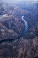 Photograph showing an aerial view of Black Canyon and the Colorado River, downstream from Hoover Dam and the Mike O'Callaghan-Pat Tillman Memorial Bridge, Nevada-Arizona border, February 3, 2010