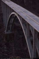 Photograph of the Mike O'Callaghan-Pat Tillman Memorial Bridge at dusk as seen from Sugarloaf Mountain near the Arizona-Nevada border, January 13, 2011
