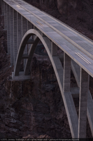 Photograph of the Mike O'Callaghan-Pat Tillman Memorial Bridge at dusk as seen from Sugarloaf Mountain near the Arizona-Nevada border, January 13, 2011