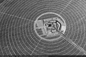 Photograph of concentric circles of service roads around construction of Unit 1 power block, April 21, 2011
