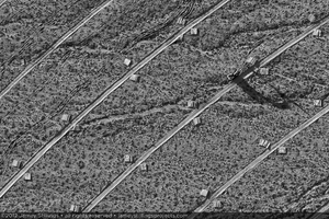 Photograph of heliostat pylon stacks near service roads of Unit 2, January 6, 2012