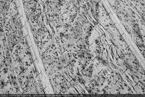 Photograph of service roads, other vehicle tracks, and pylon shadows prior to heliostat installation, June 2, 2012
