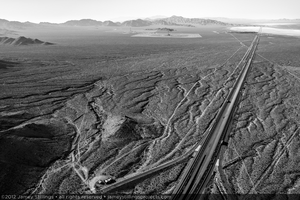 Photograph of Interstate 15 running north toward Primm and Las Vegas, Nevada with Ivanpah in the distance, June 2, 2012