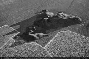 Photograph of hill formation rising above the surrounding alluvial slope at the eastern boundaries of Units 2 and 3, October 27, 2012