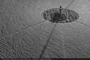 Photograph of tower and power block surrounded by heliostats of Unit 1, October 27, 2012