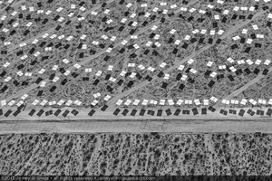 Photograph of heliostats near the boundary of Unit 3, June 25, 2013